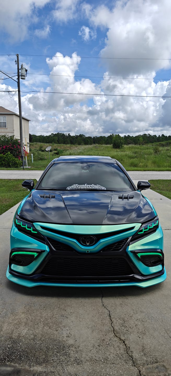 Customer photo review of Candy Metallic Neon Ice Blue Vinyl Wrap