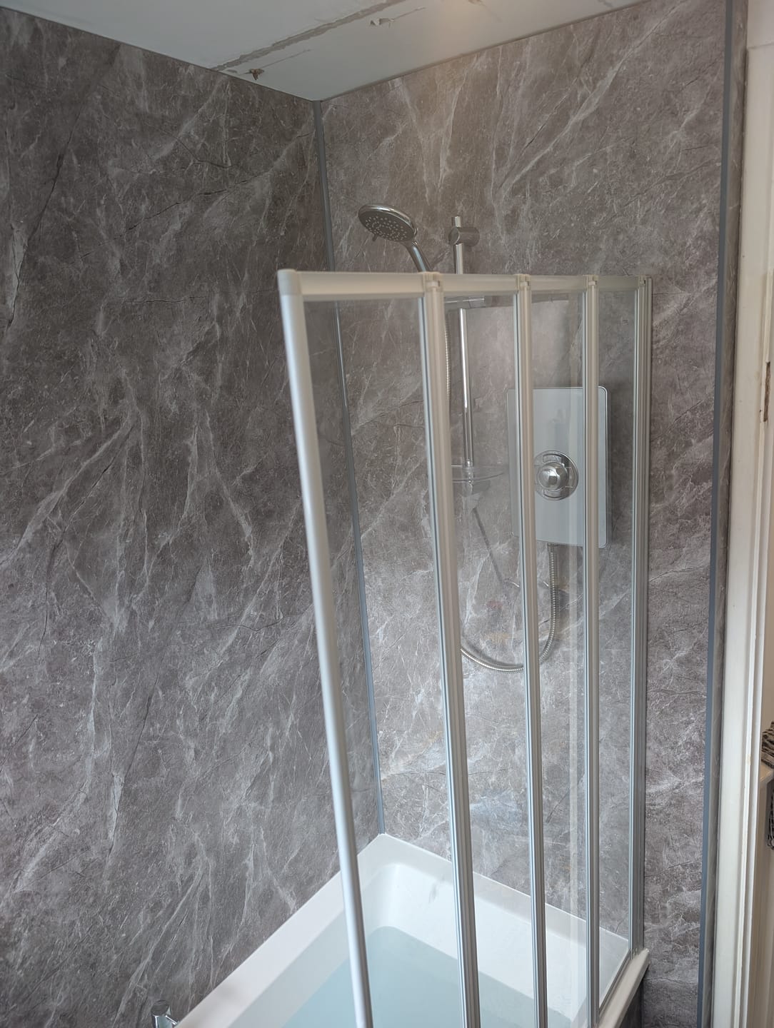 Customer photo review of 10mm Dark Grey Marble Matt Shower Panel 1M x 2.4M