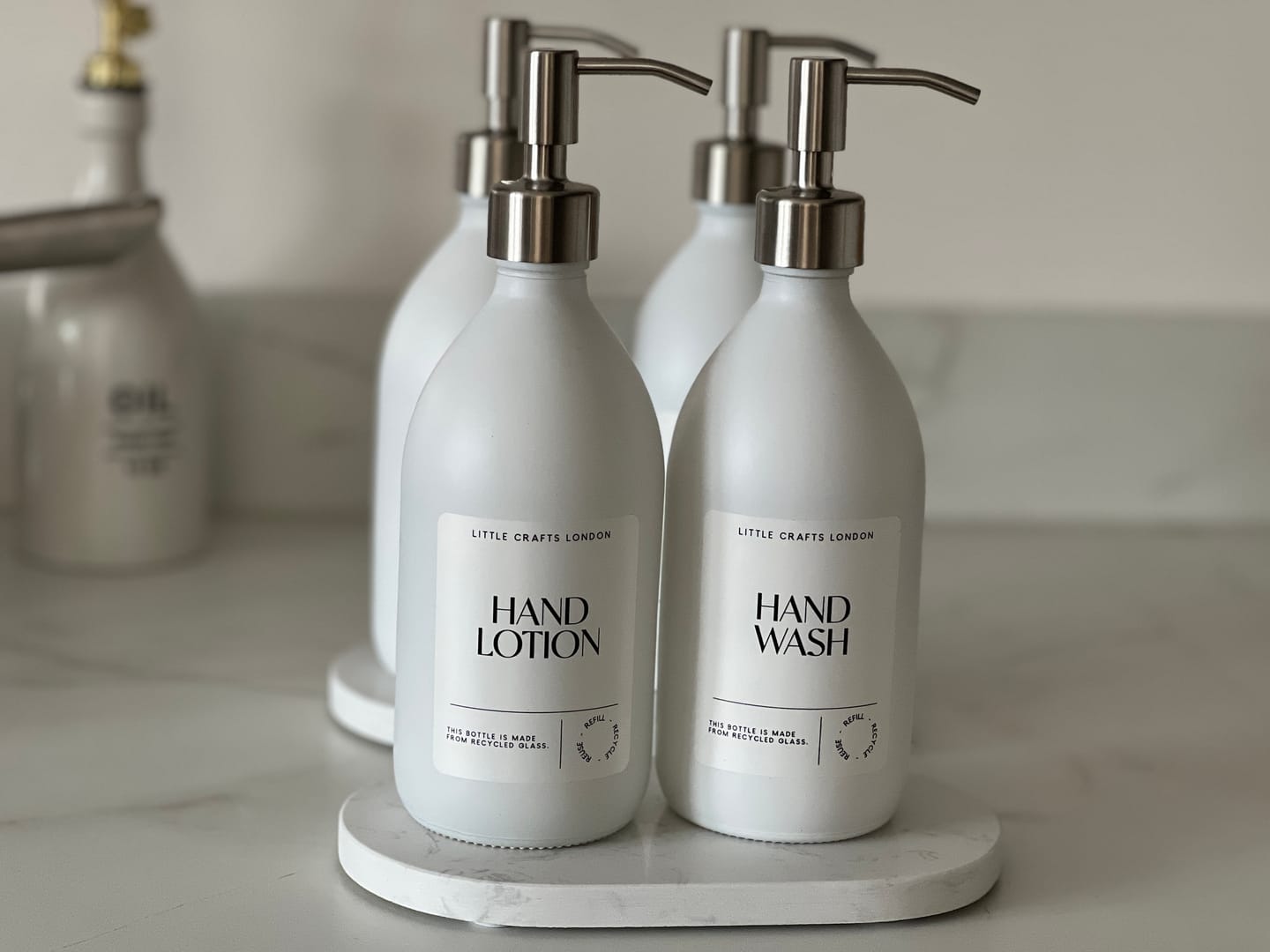 Customer photo review of Set of 2 Milky White Glass Bottle 500 ML with Stainless Steel Pump & Small Tray (White Label)