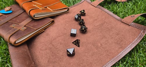 Customer photo review of URWizards D&D Obsidian Gemstone Engraved Dice Set