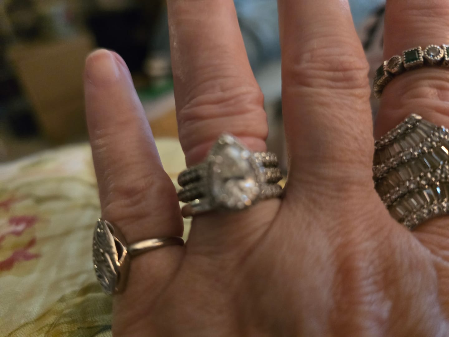 Customer photo review of Halo Pear Moissanite Triple Row Pave Engagement Ring