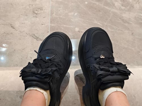 Customer photo review of Bow lace sneakers