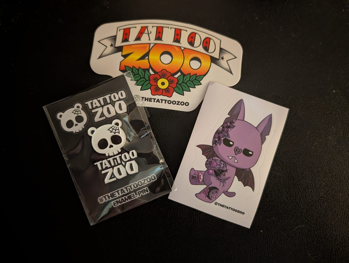 Customer photo review of Tattoo Zoo Logo 2 Enamel Pin
