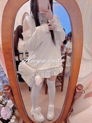 Customer photo review of Bow lace sneakers
