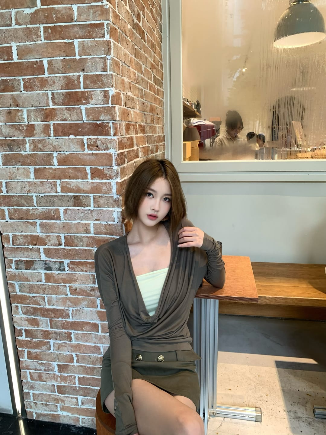 Customer photo review of IAMXIAA Draped Deep V Long Sleeve Top