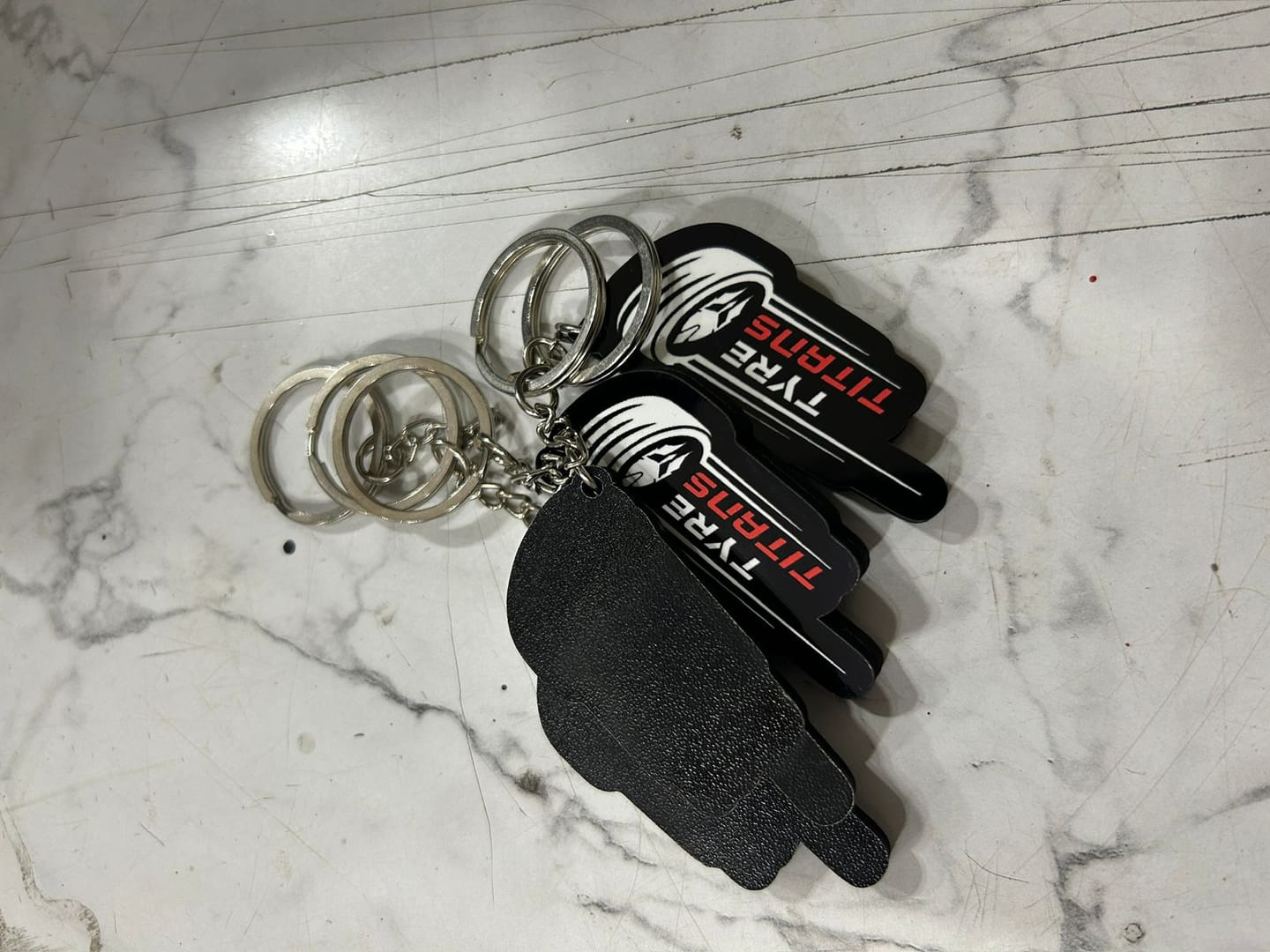 Customer photo review of Premium Customized Keychains | Best for Brand Promotion | PrintMine.in