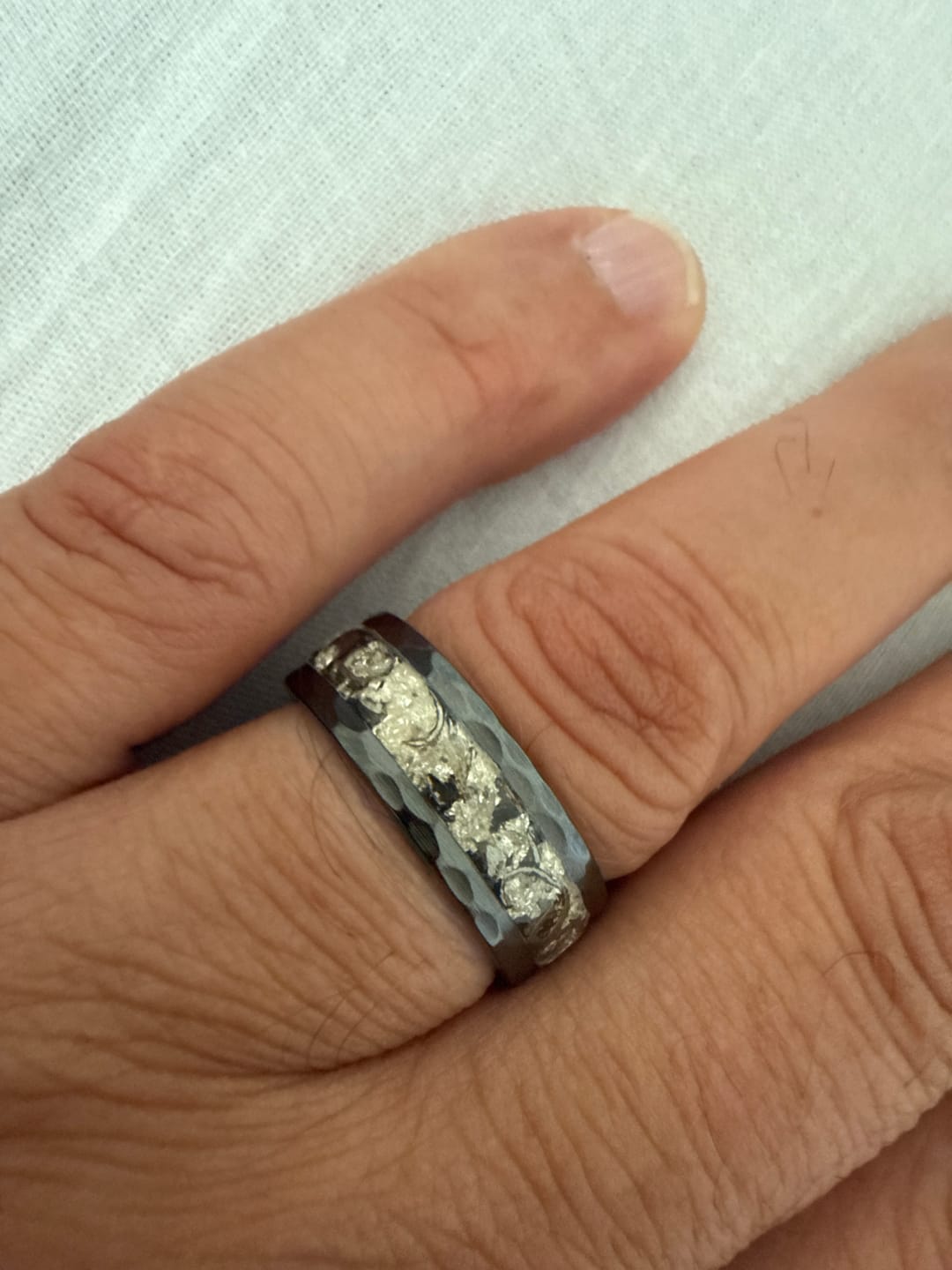 Customer photo review of Hammered ceramic ring filled with silver leaf 8 mm for Dan