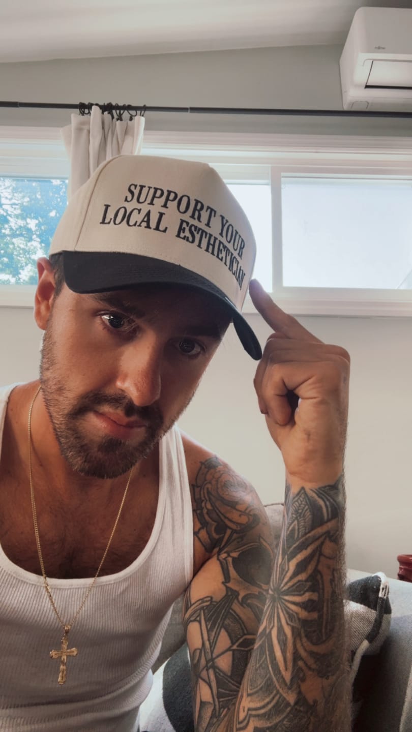 Customer photo review of Support Your Local Esthetician - Trucker Hat