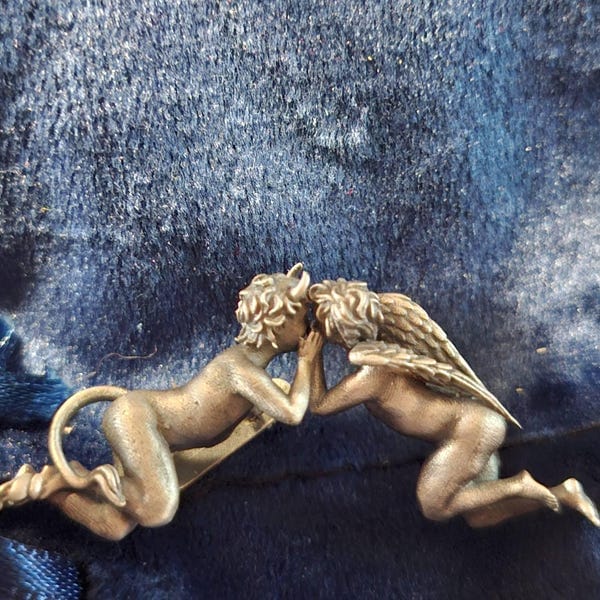 Customer photo review of Angel and Devil Whispering Earrings