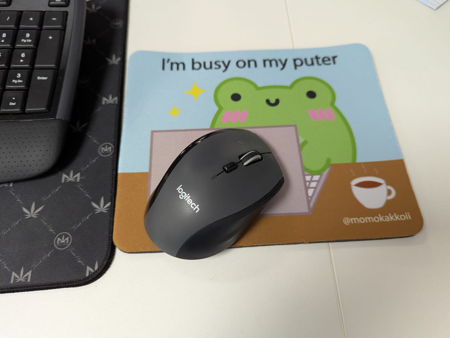 Customer photo review of I'm Busy On My Puter Mouse Pad