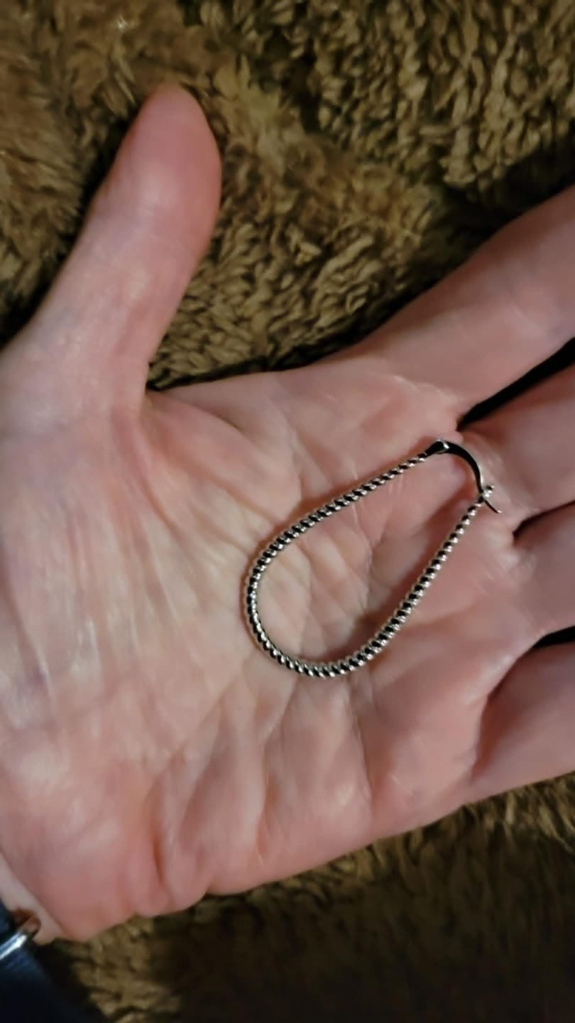 Customer photo review of Angelica 18k White Gold Plated 45mm Twisted U-Shaped Hoop Earrings