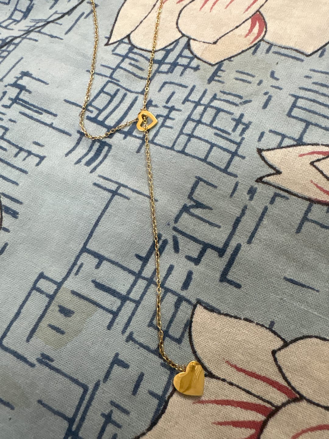 Customer photo review of Two Heart Gold Lariat Necklace