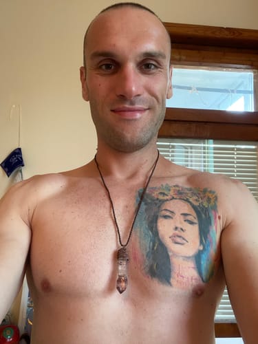 Customer photo review of Spiritual Energy Super 7 Amethyst Pendants