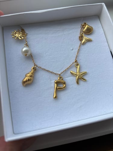 Customer photo review of GOLD OCEAN LETTER NECKLACE