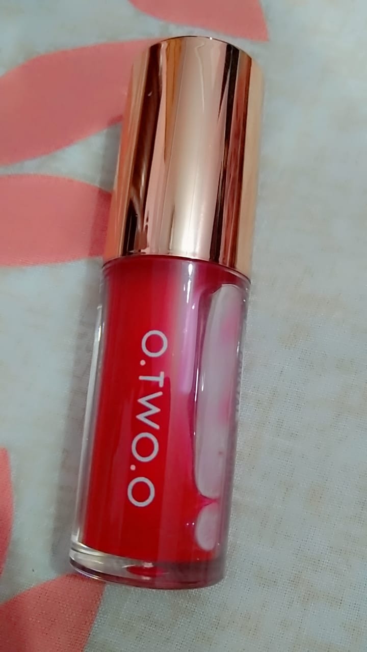 Customer photo review of O.TWO.O PLUMP SHINY CRYSTAL LIP GLOSS