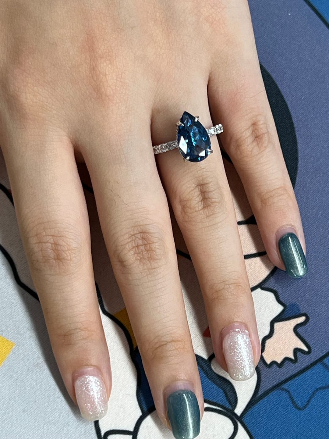 Customer photo review of Louily Unique 3.0 Carat Pear Cut Blue Sapphire Engagement Ring In Sterling Silver