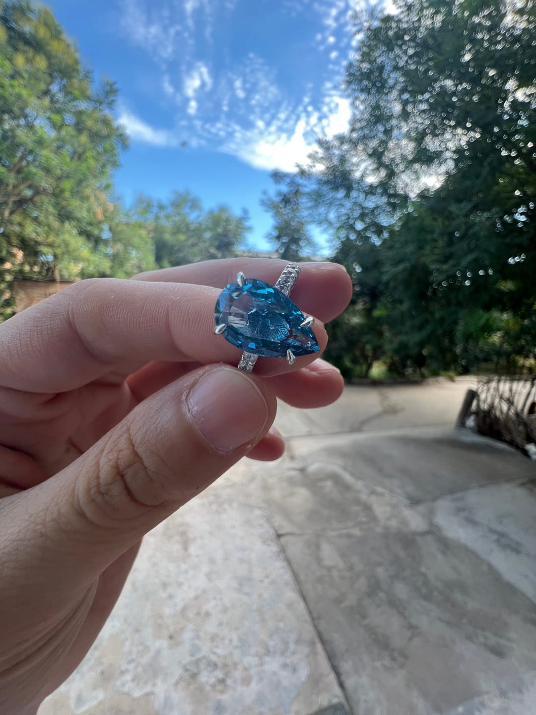 Customer photo review of Louily Unique 3.0 Carat Pear Cut Blue Sapphire Engagement Ring In Sterling Silver