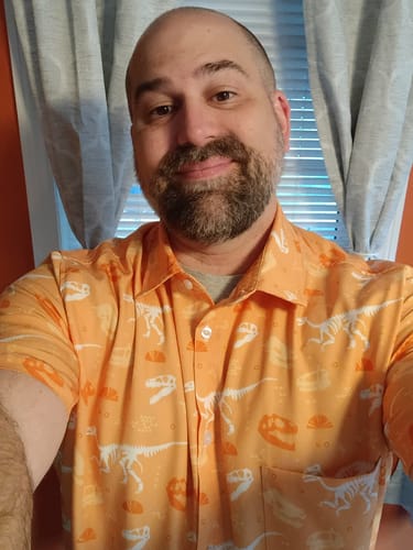 Customer photo review of Orange Dinosaur Bones Button Up Shirt