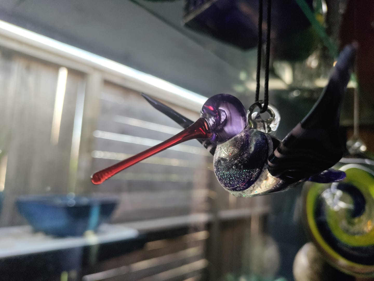 Customer photo review of Purple Dichroic Twist Glass Hummingbird with Infused Ash