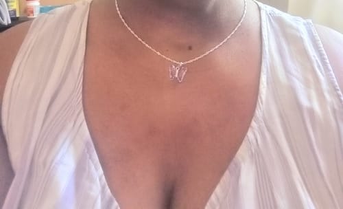 Customer photo review of Virtue Double Cross Necklace