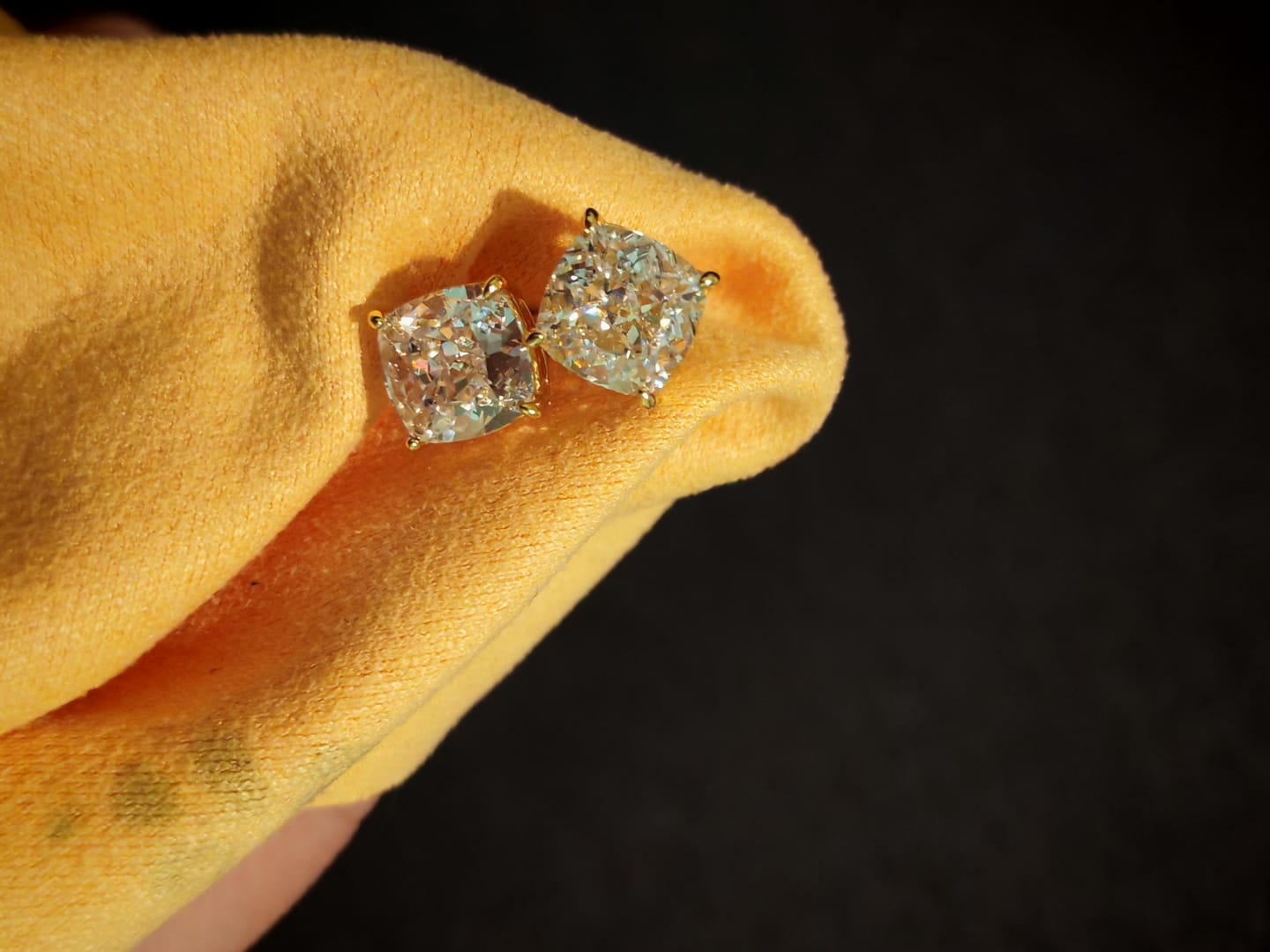 Customer photo review of Louily 1.5 CT Cushion Cut Sterling Silver Women's Stud Earrings