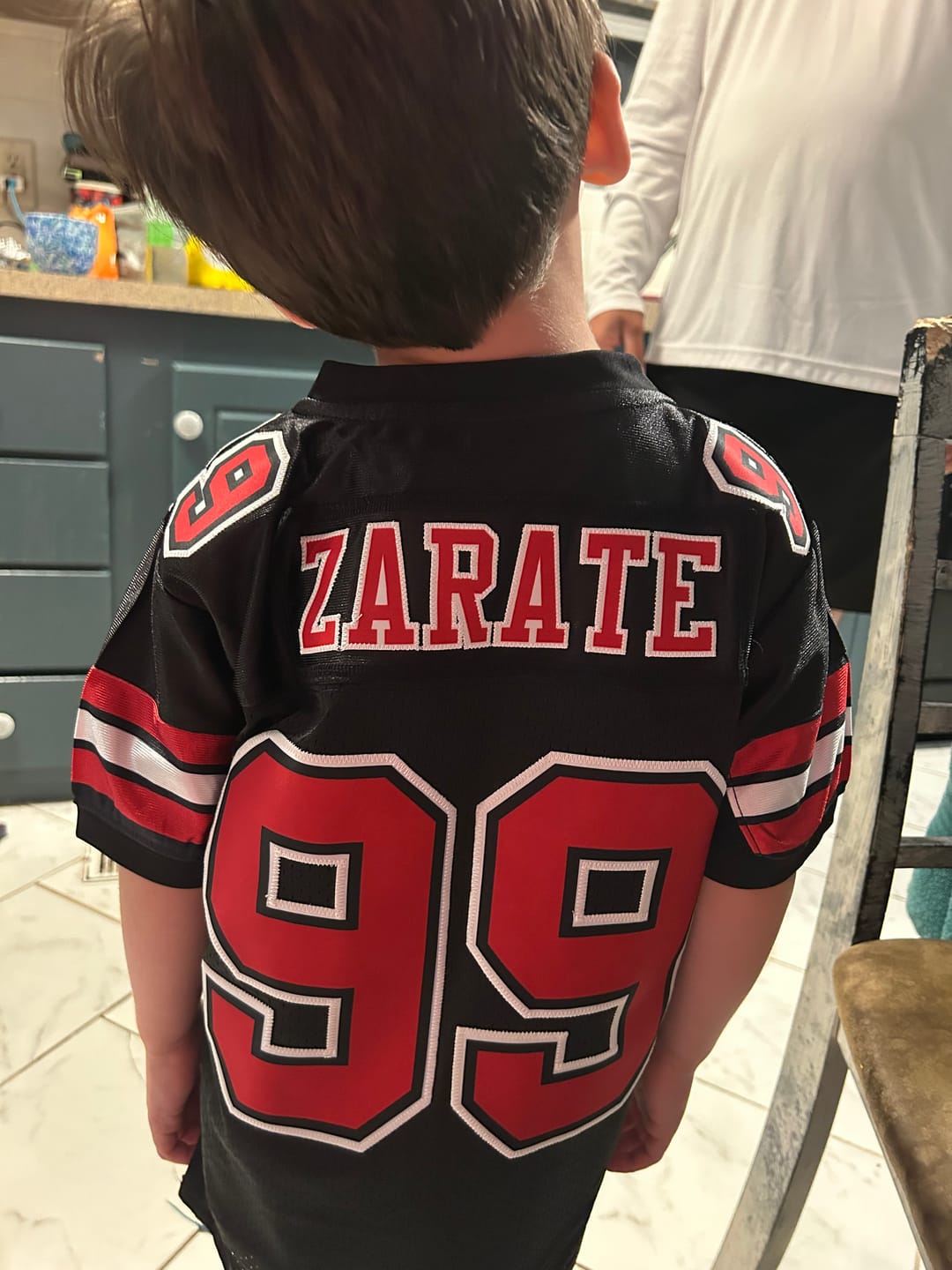 Customer photo review of Custom Black Red-White Classic Style Mesh Authentic Football Jersey