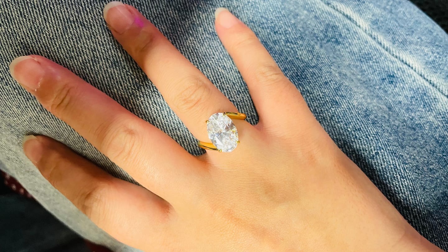 Customer photo review of S925 Moissanite 5.5Ct Oval Cut Unique Engagement Ring Travel Rings In Sterling Silver
