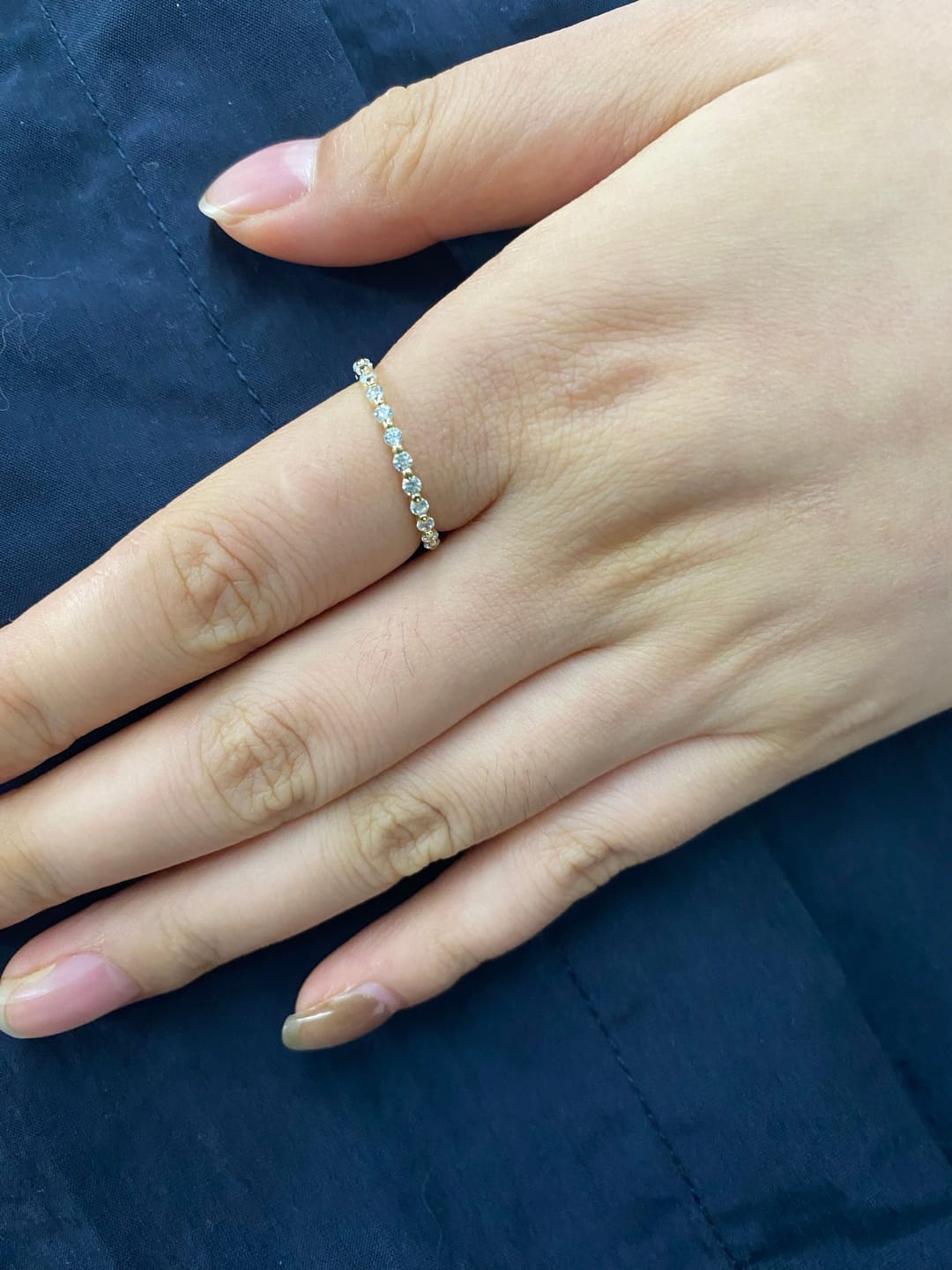 Customer photo review of Louily Classic Round Cut Full Eternity Wedding Band In Sterling Silver