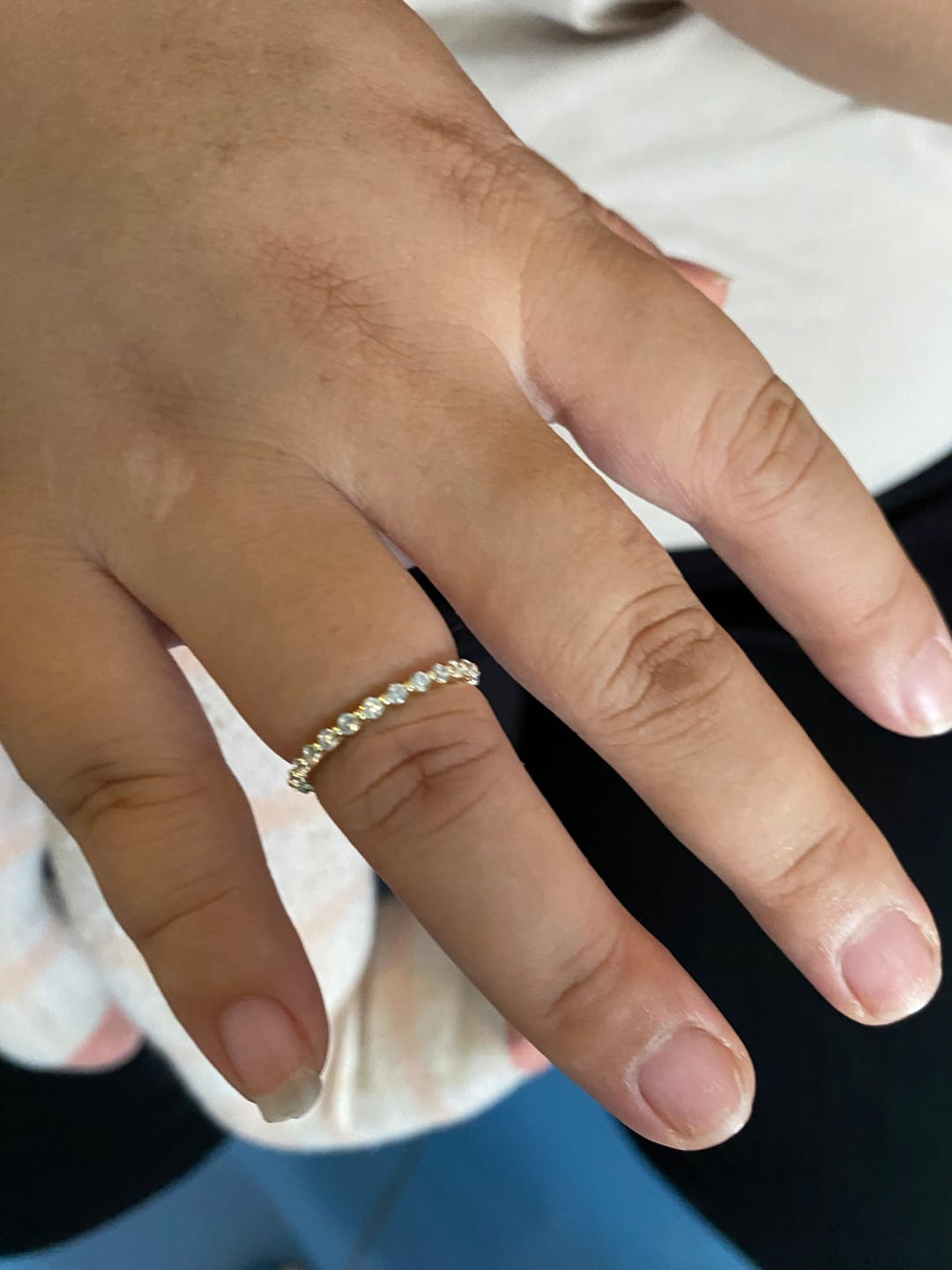 Customer photo review of Louily Classic Round Cut Full Eternity Wedding Band In Sterling Silver