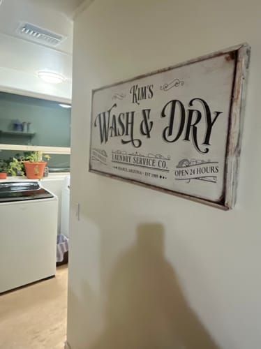 Customer photo review of Personalized Laundry Service Sign