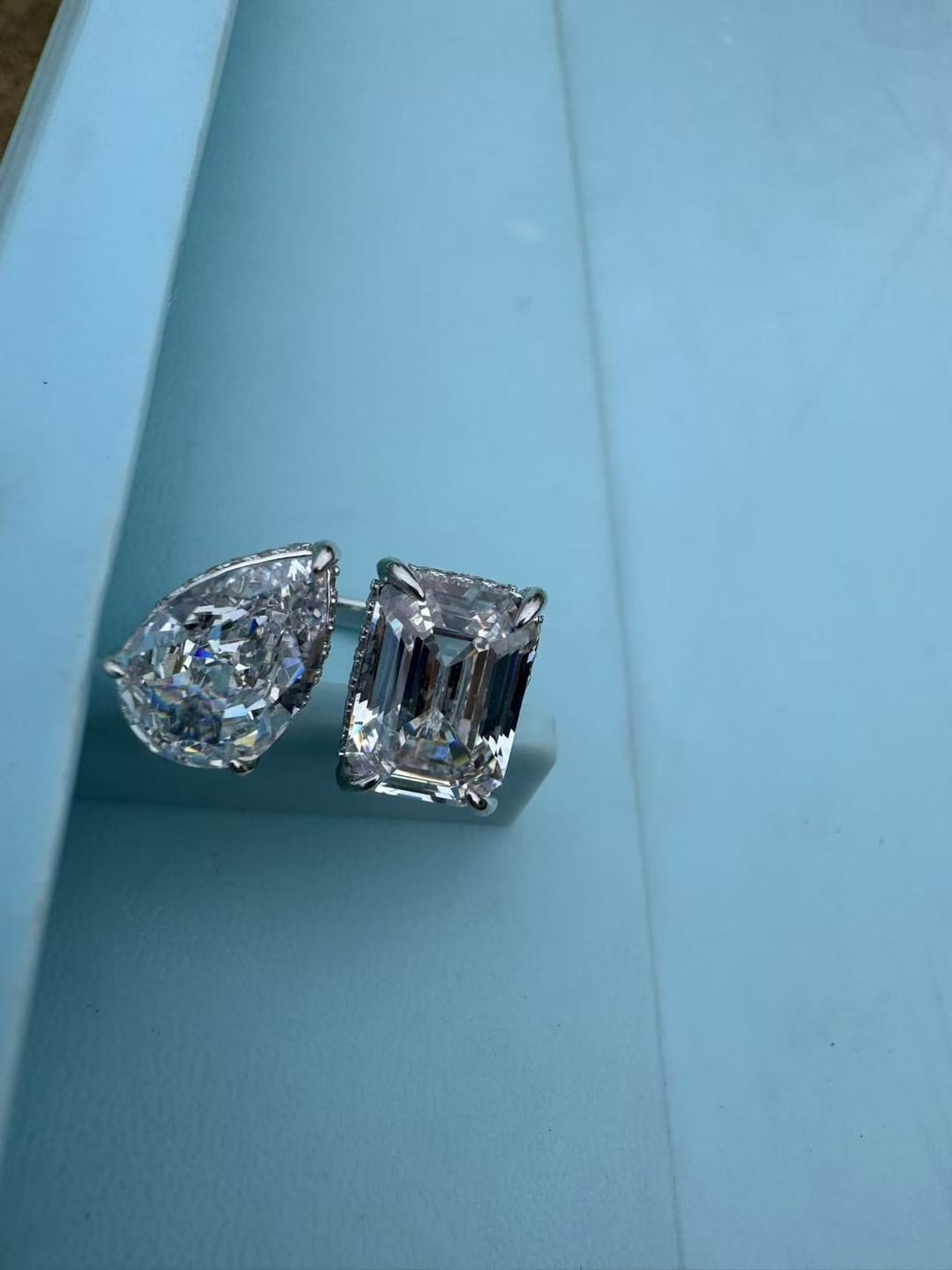Customer photo review of Louily Unique Double Stones Design Emerald Cut & Pear Cut Engagement Ring