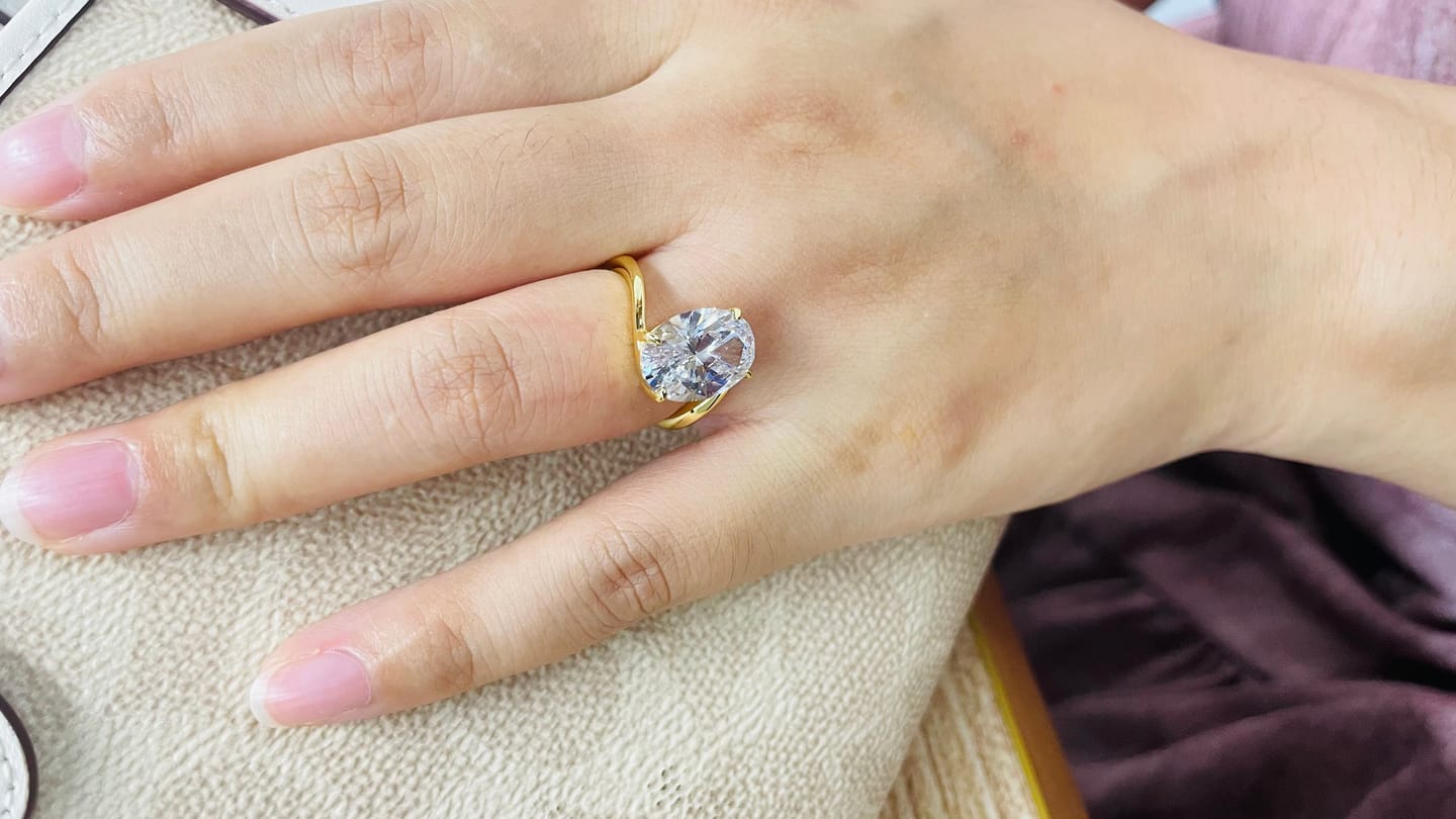 Customer photo review of S925 Moissanite 5.5Ct Oval Cut Unique Engagement Ring Travel Rings In Sterling Silver