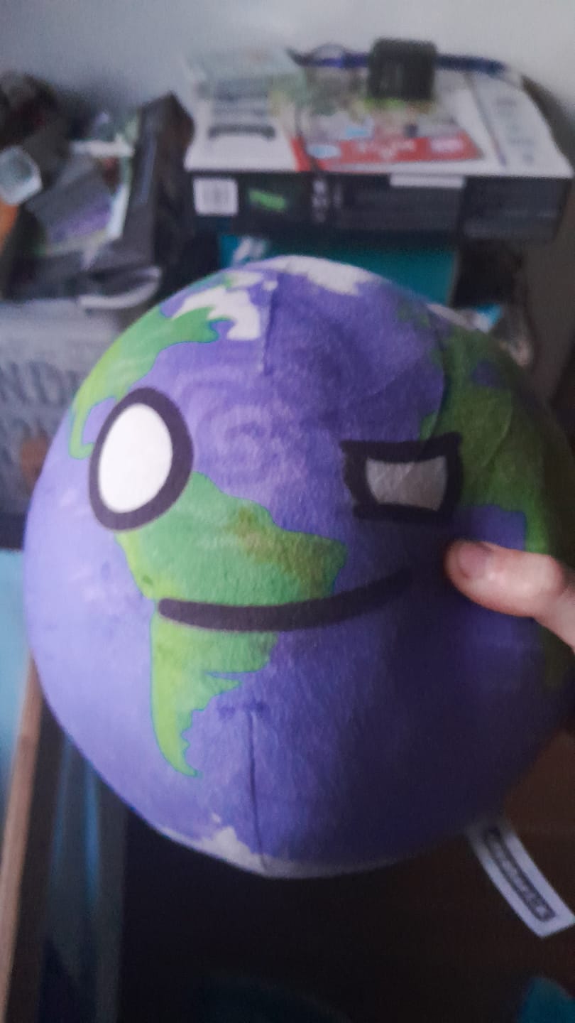 Customer photo review of The SolarBalls Earth Plush