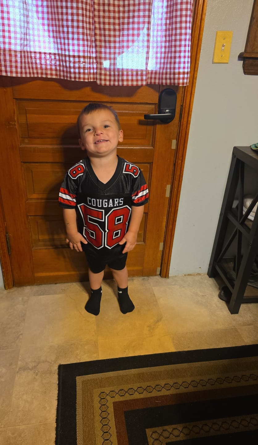 Customer photo review of Custom Black Red-White Classic Style Mesh Authentic Football Jersey
