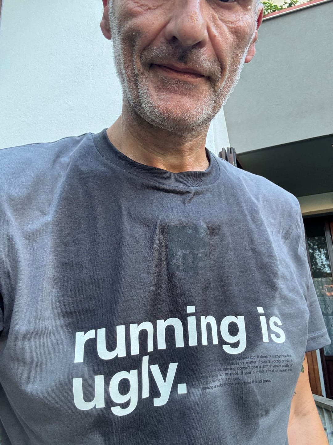 Customer photo review of tee, running is ugly, anthracite.