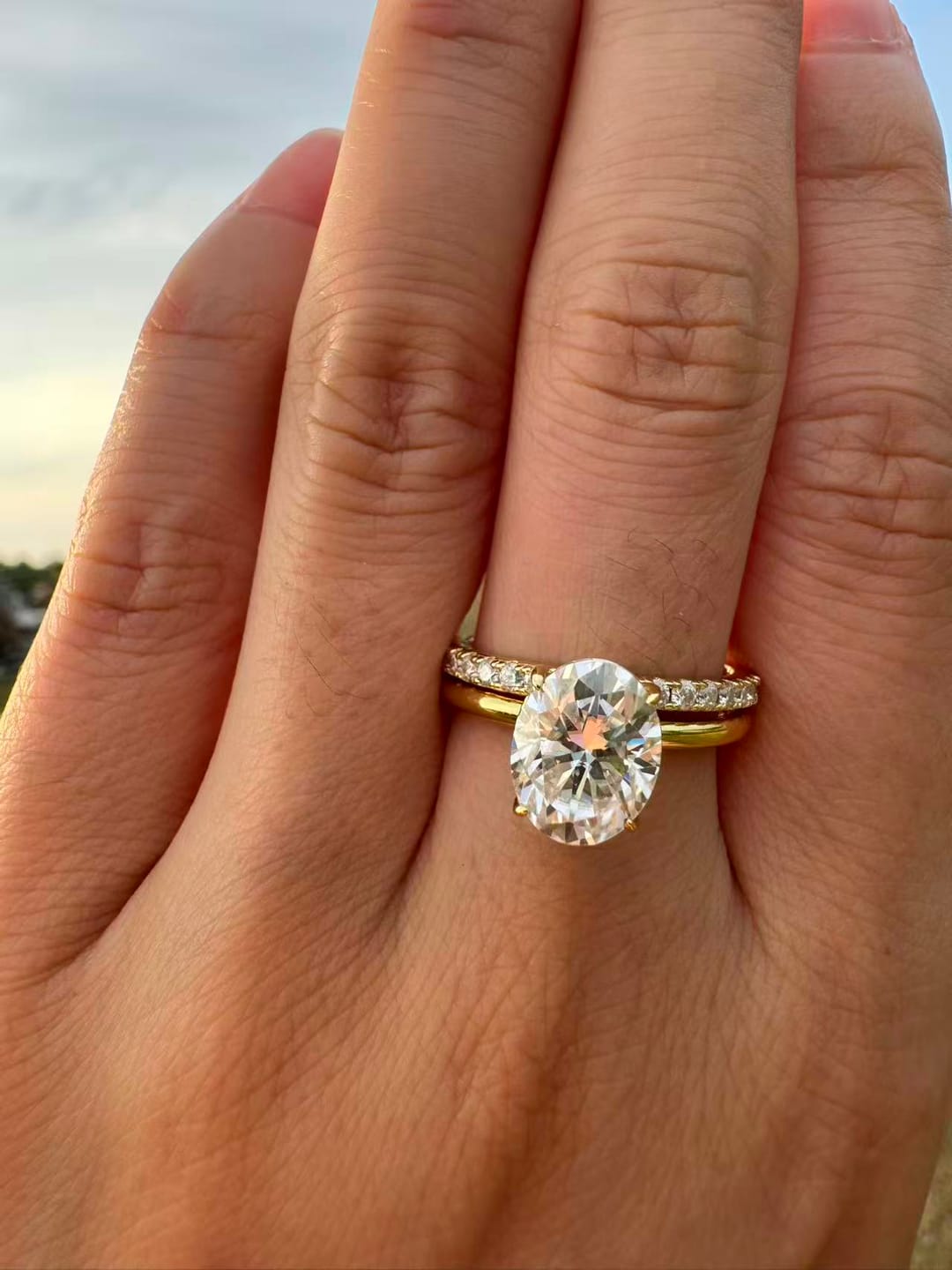 Customer photo review of Moissanite 2.0 Ct Hidden Halo Solitaire Oval Cut Yellow Gold Wedding Ring