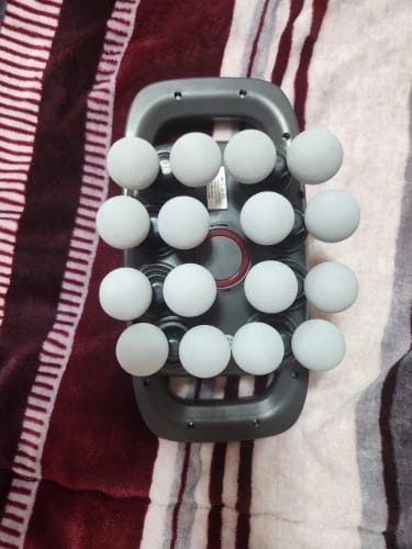 Customer photo review of Lumora Muscle Recovery Massager™