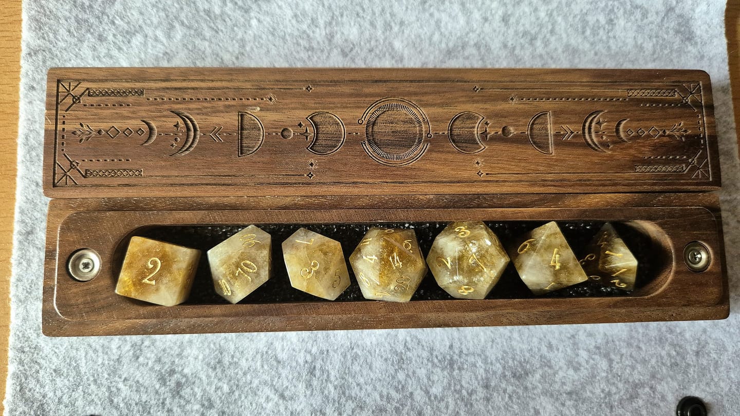 Customer photo review of URWizards D&D Citrine Gemstone Engraved Dice Set(Limited edition)