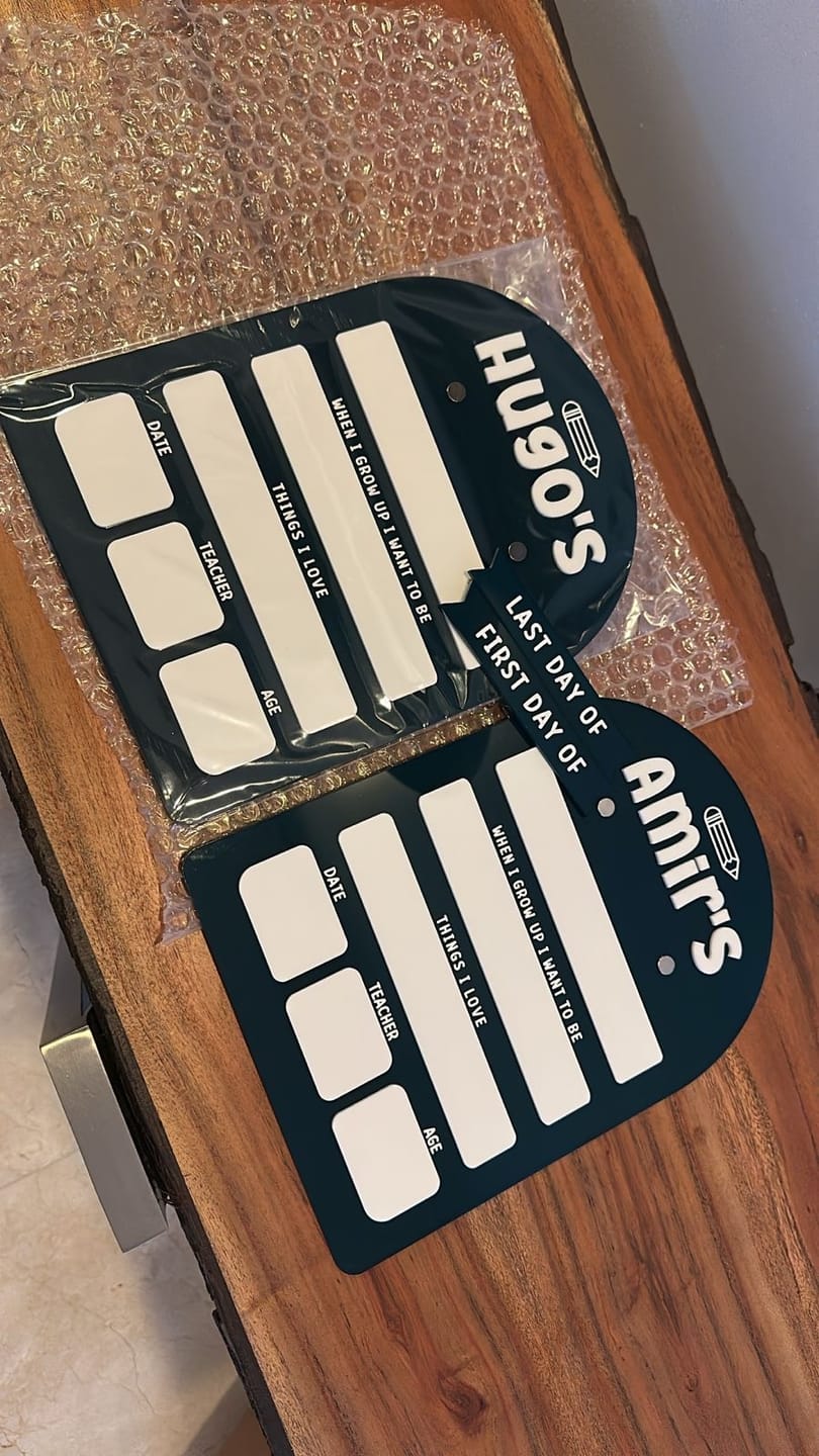 Customer photo review of FIRST & LAST DAY Acrylic Milestone Board (Reusable) - Colored Arched Small Large