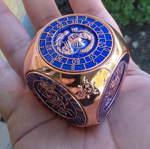 Customer photo review of Masters Dice Relic #002 – 7-in-1 The Oracle’s Eye Cube Spinner DND Dice for Dungeon Masters & Collectors