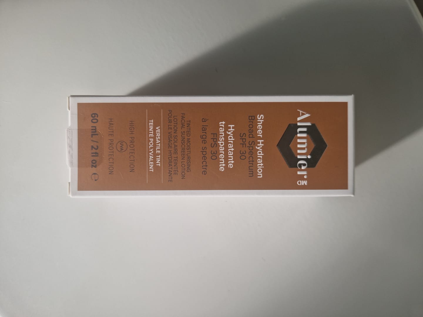 Customer photo review of Alumier Sheer Hydration Broad Spectrum SPF 30 (Versatile Tint) (60ml)
