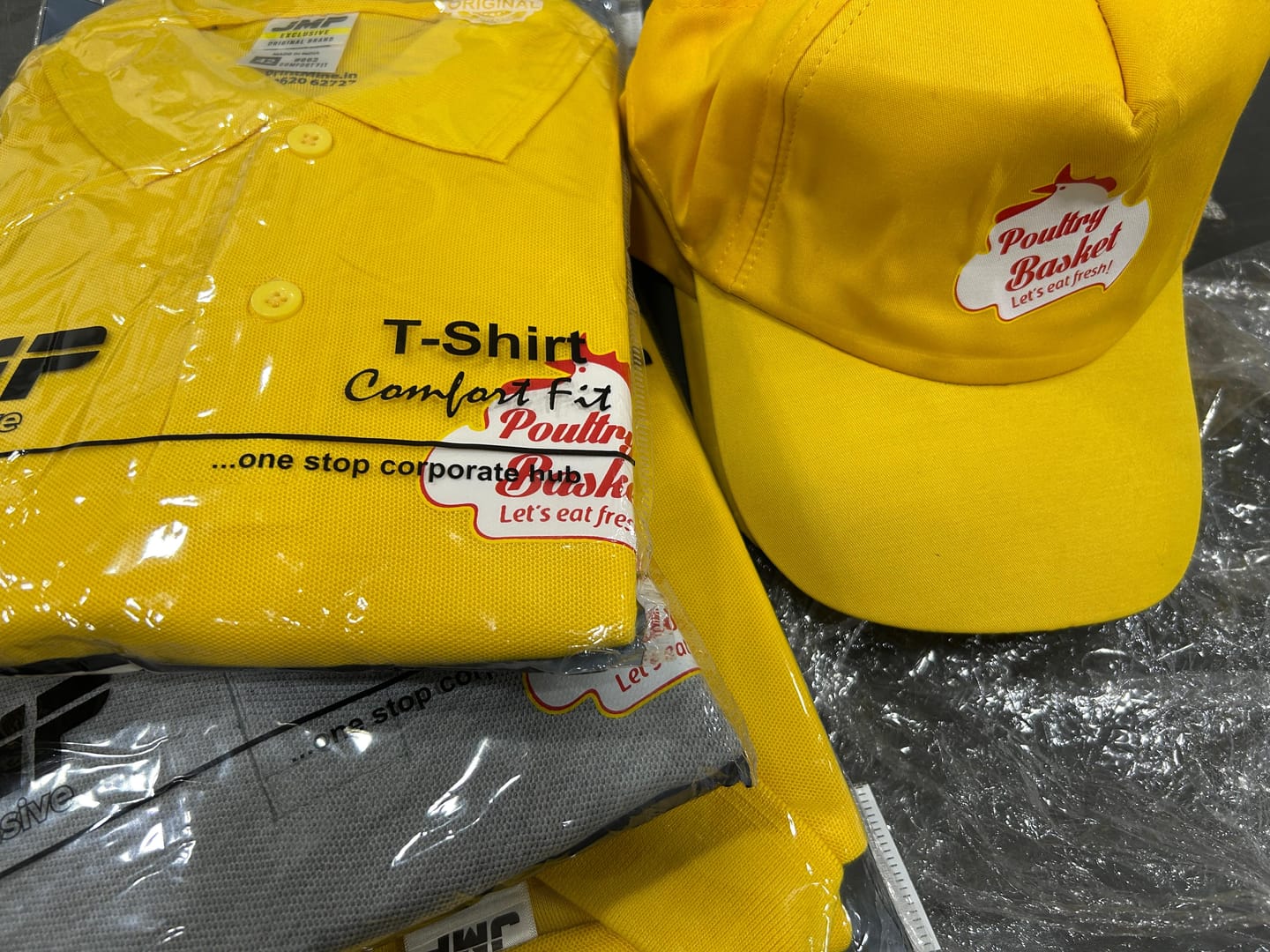 Customer photo review of Customized Polo T-Shirt & Cap  | With Your Company Logo | PrintMine.in