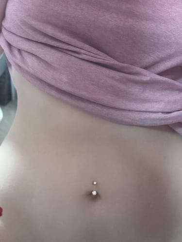 Allanahh X. review of Piercing Post Length? Fee applies for non-standard sizes as our jeweller will adjust the post length prior to dispatch. image 1 out of 1