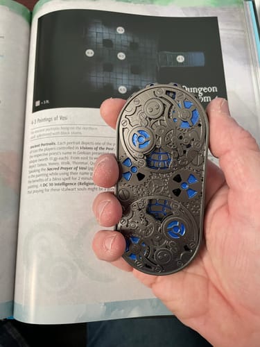 Customer photo review of Masters Dice Artifact #001 – 7-in-1 Gearforged Spinner DND Dice for Dungeon Masters & True Fans