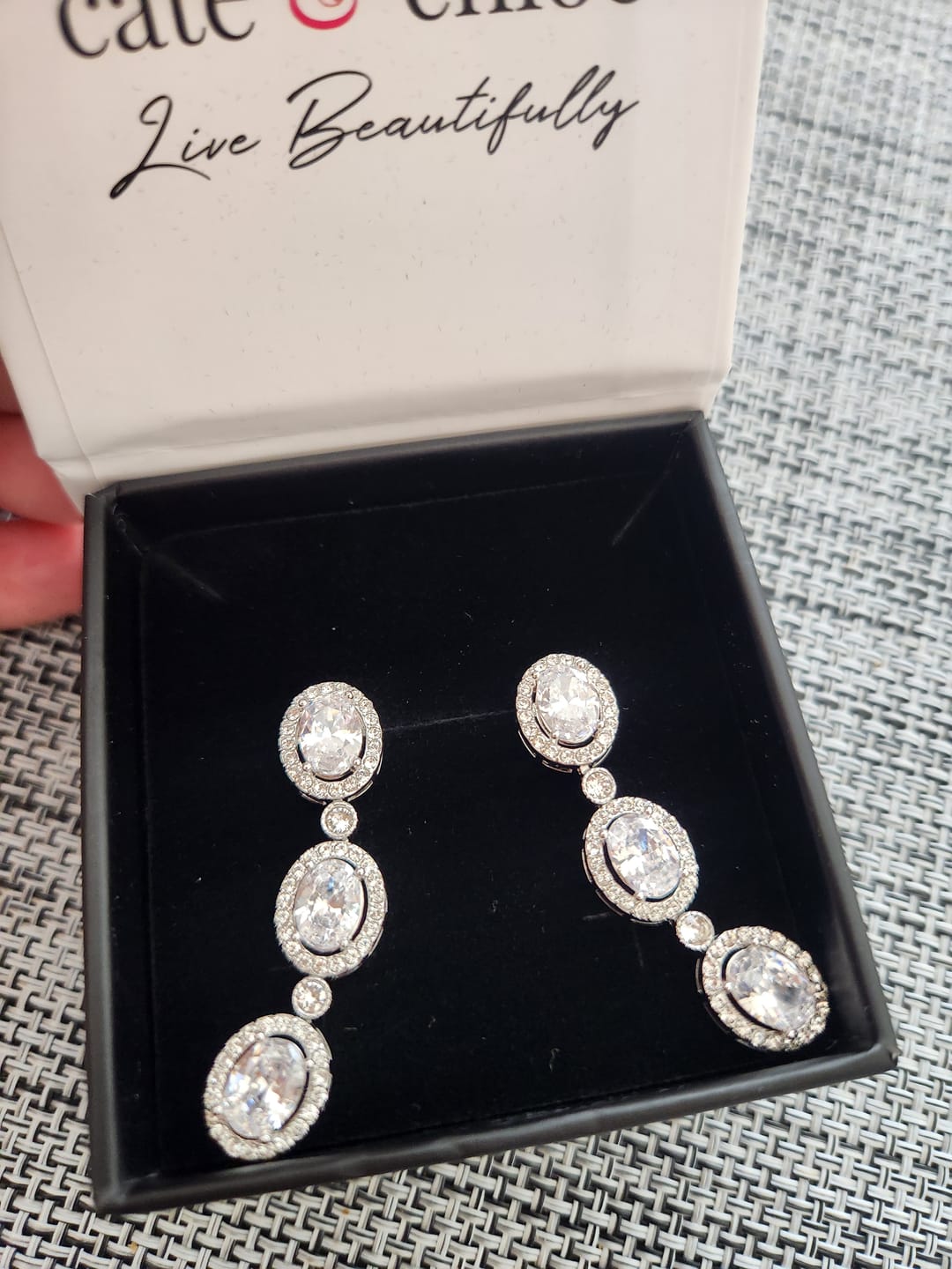 Customer photo review of Lorraine 18k White Gold Plated Dangle Earrings with Simulated Diamond Crystals