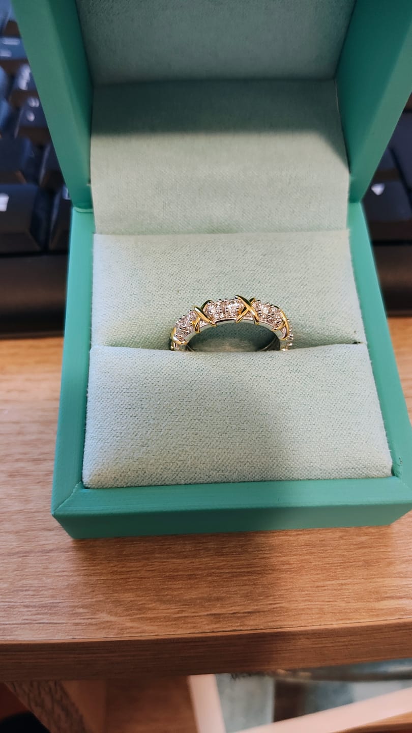 Customer photo review of Alternating Round Moissanite And Golden Xs Eternity Wedding Band Ring