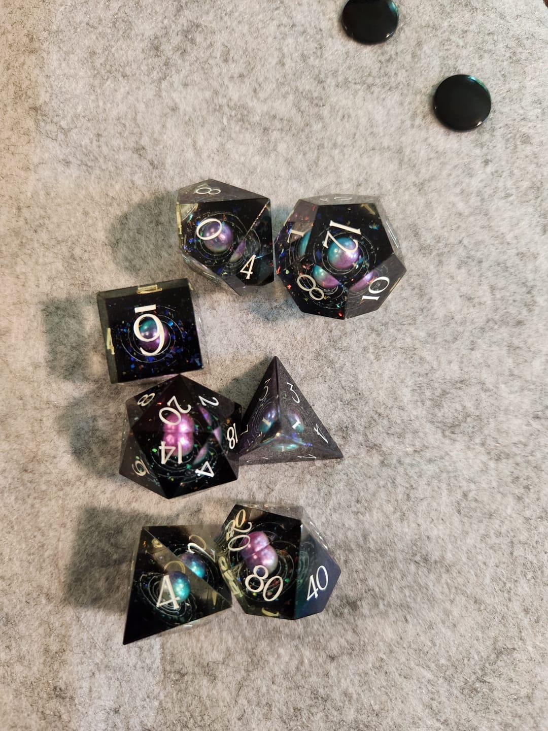 Customer photo review of URWizards D&D Resin Engraved Dice Set The Galaxy