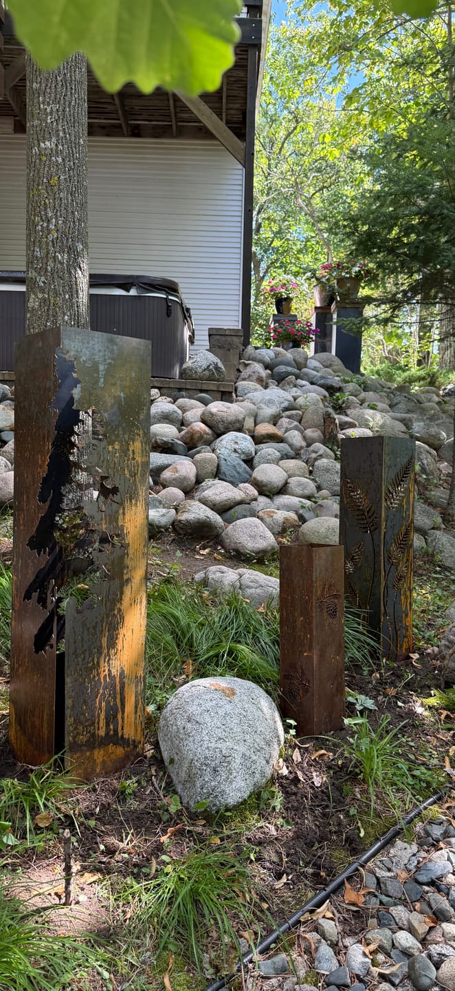 Customer photo review of Fern Garden Column – Metal Outdoor Sculpture & Well Cover – Rustic Steel Garden Decor