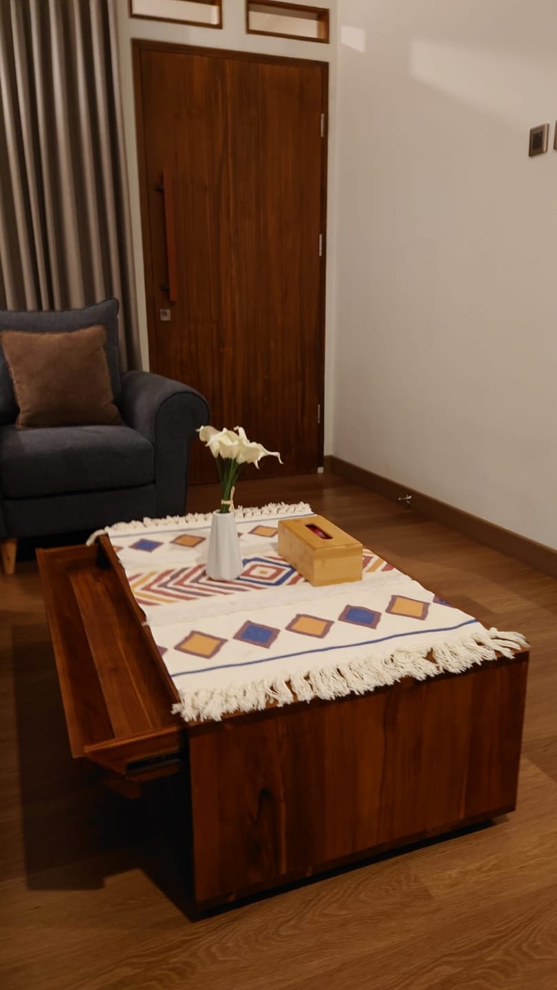 Customer photo review of Timeless Teak Coffee Table with Seamless Storage