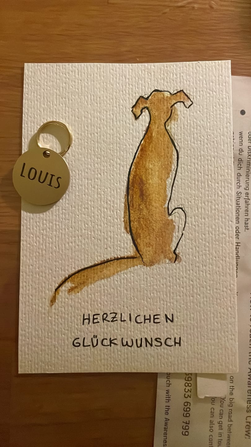 Customer photo review of Runde Hundemarke mit Gravur, Name und Telefon personalisiert
